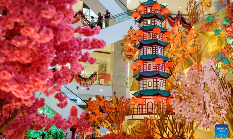 People visit the Pavilion Paper Art Garden in Kuala Lumpur, Malaysia, Jan. 11, 2022. The Pavilion Paper Art Garden, with splendid traditional Chinese art of paper cutting works, was set in celebrations of the upcoming Chinese New Year.(Photo: Xinhua)